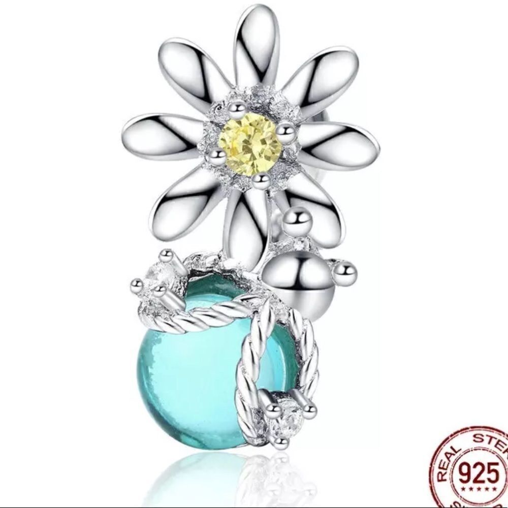 SILVER FLOWER AND BEE ON AQUA BALL PENDANT
